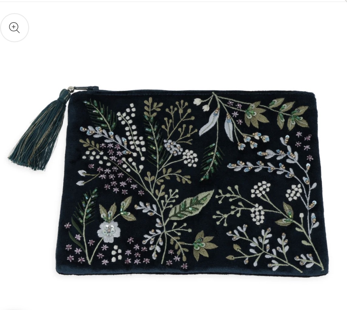 Bolsa de terciopelo azul oscuro con cremallera y flores
